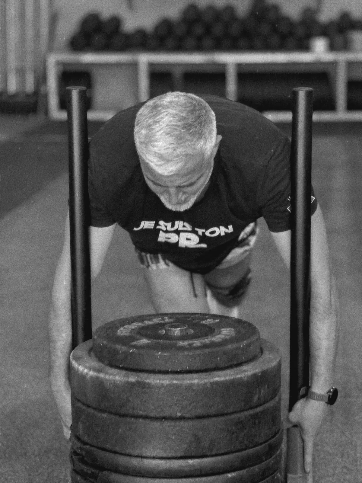 Sled push chargé de disques, une station Hyrox
